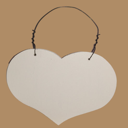 Heart-shaped white sign with a string on a light gray background