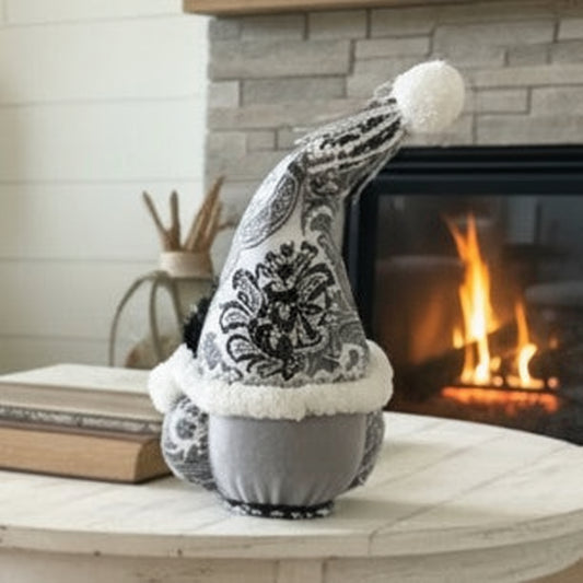 Decorative item with floral design on a wooden surface