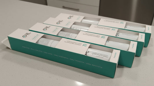 Multiple boxes of a skincare product on a gray surface