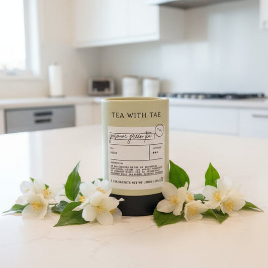 Tea canister on a wooden table with blurred background