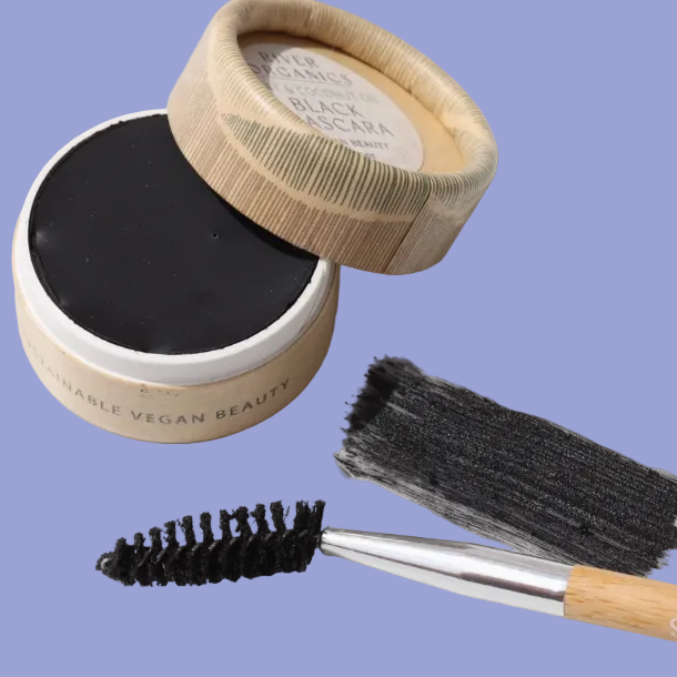 handcrafted black mascara in a no-wase container with applicator brush