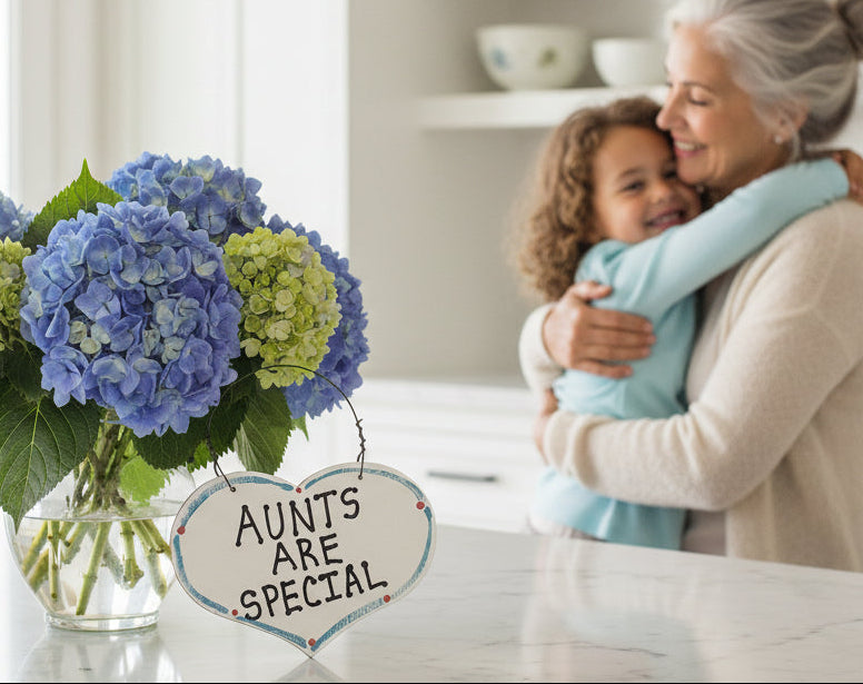 Heart-shaped sign with 'Aunts are special' text on a white background