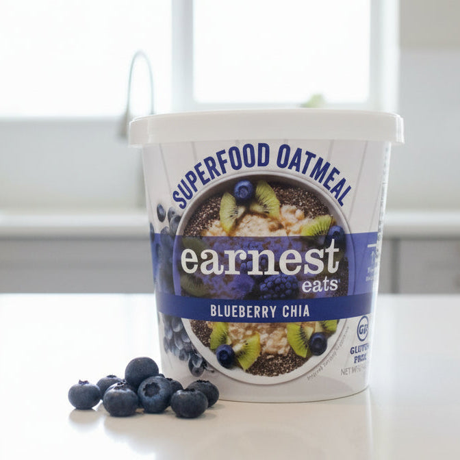 Container of Earnest Eats Superfood Oatmeal on a kitchen counter