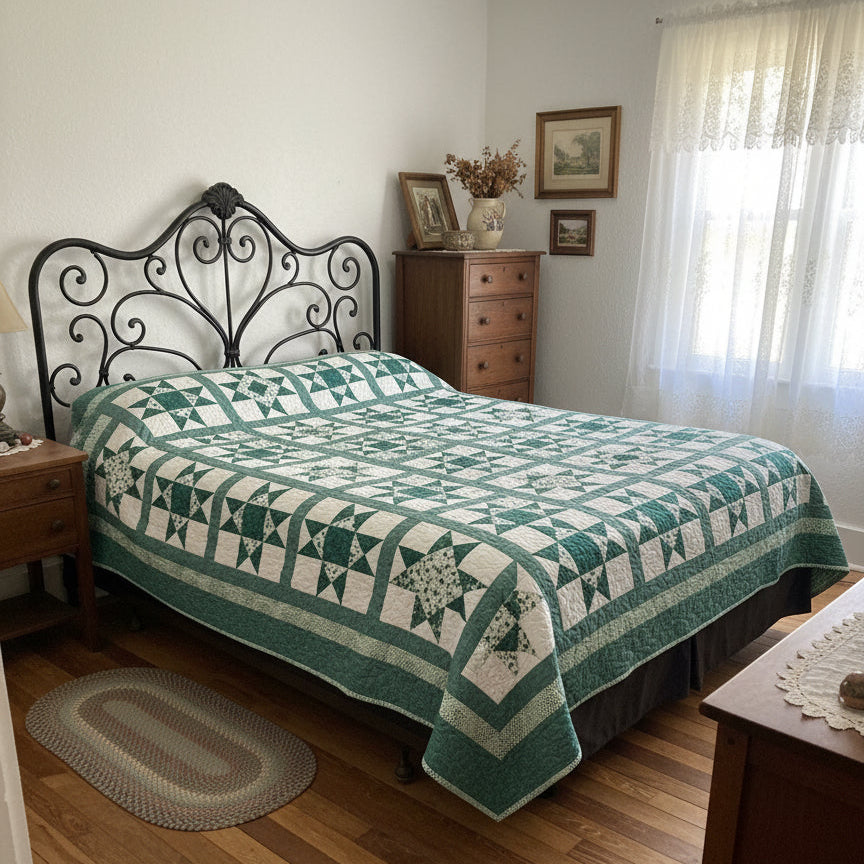 Quilt with green and white star pattern on a wooden bed with headboard.