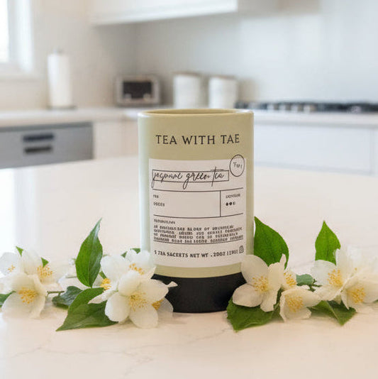 Tea canister on a wooden table with blurred background