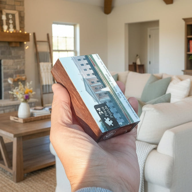 Living room with a fireplace, couch, and coffee table.
