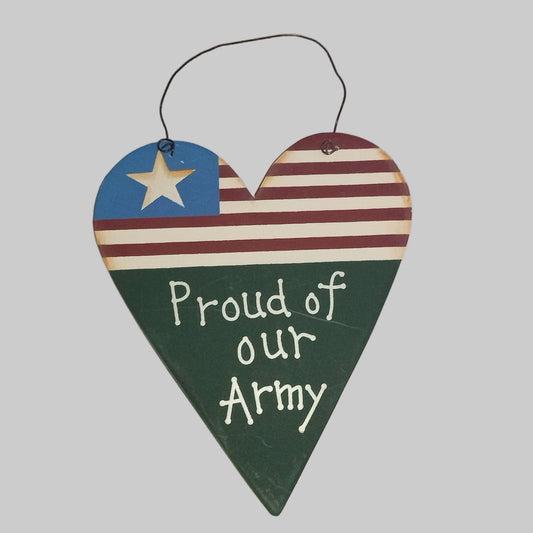 Heart-shaped sign with American flag design and 'Proud of our Army' text on a light gray background