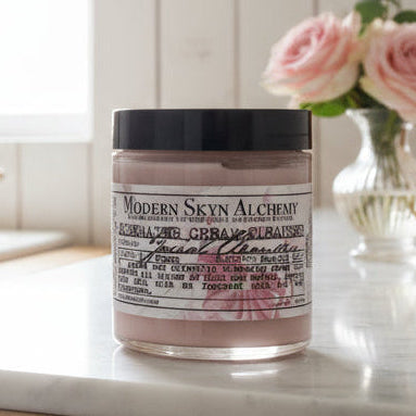 Jar of soap on a bathroom counter with a sink and decorative elements in the background