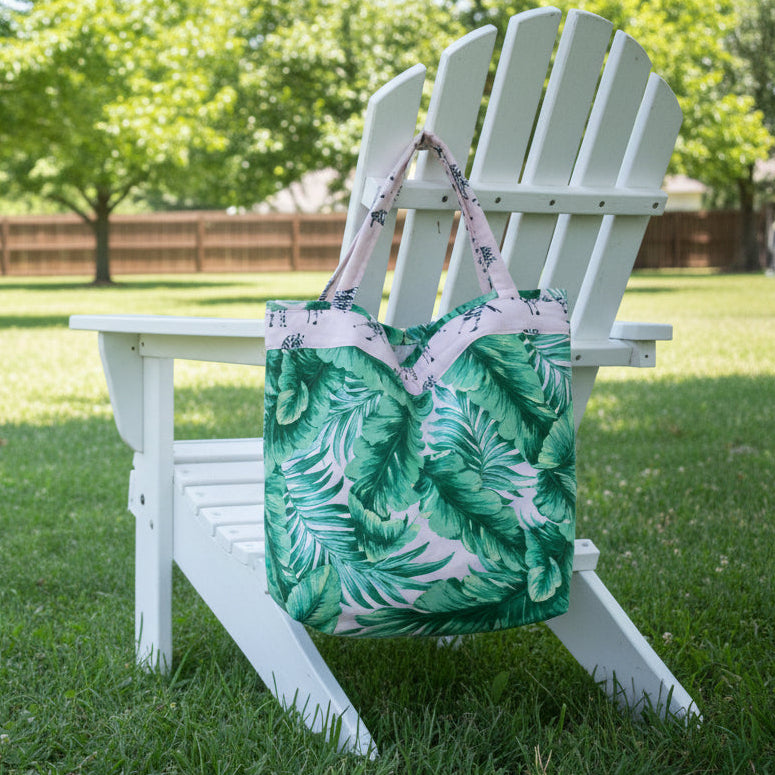 Green leaf-patterned bag on a chair indoors