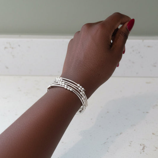 Timeless wire bracelet being worn
