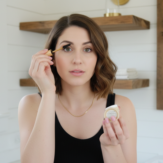 Woman applying vegan black no-waste mascara