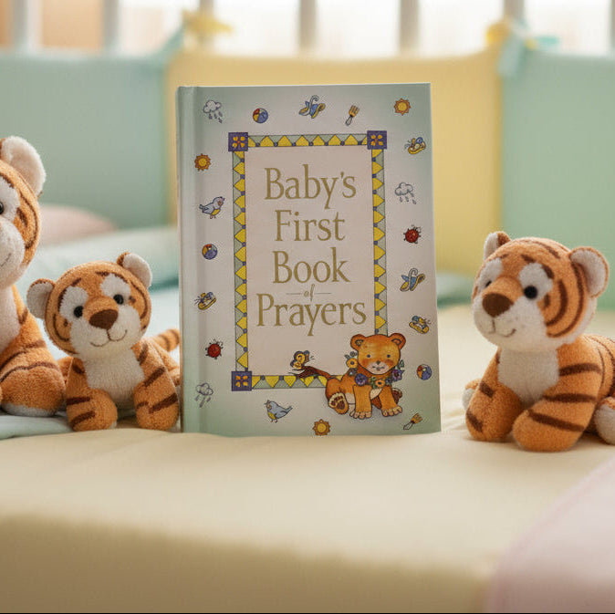 Baby's First Book of Prayers on a woven surface