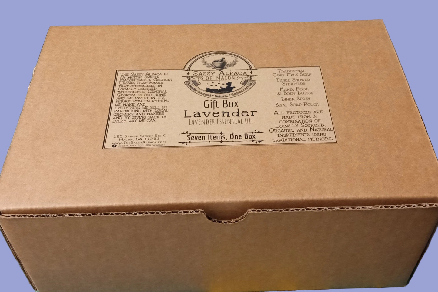 Brown cardboard gift box with 'Lavender' label on a cutting mat.