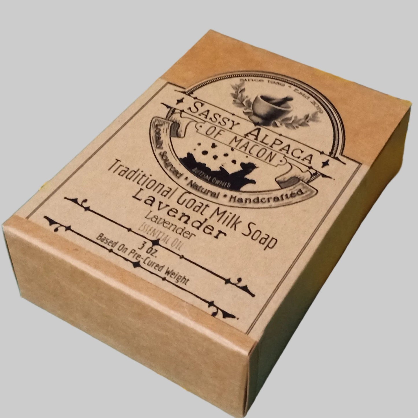 Kraft paper soap box on a cutting mat with measurements