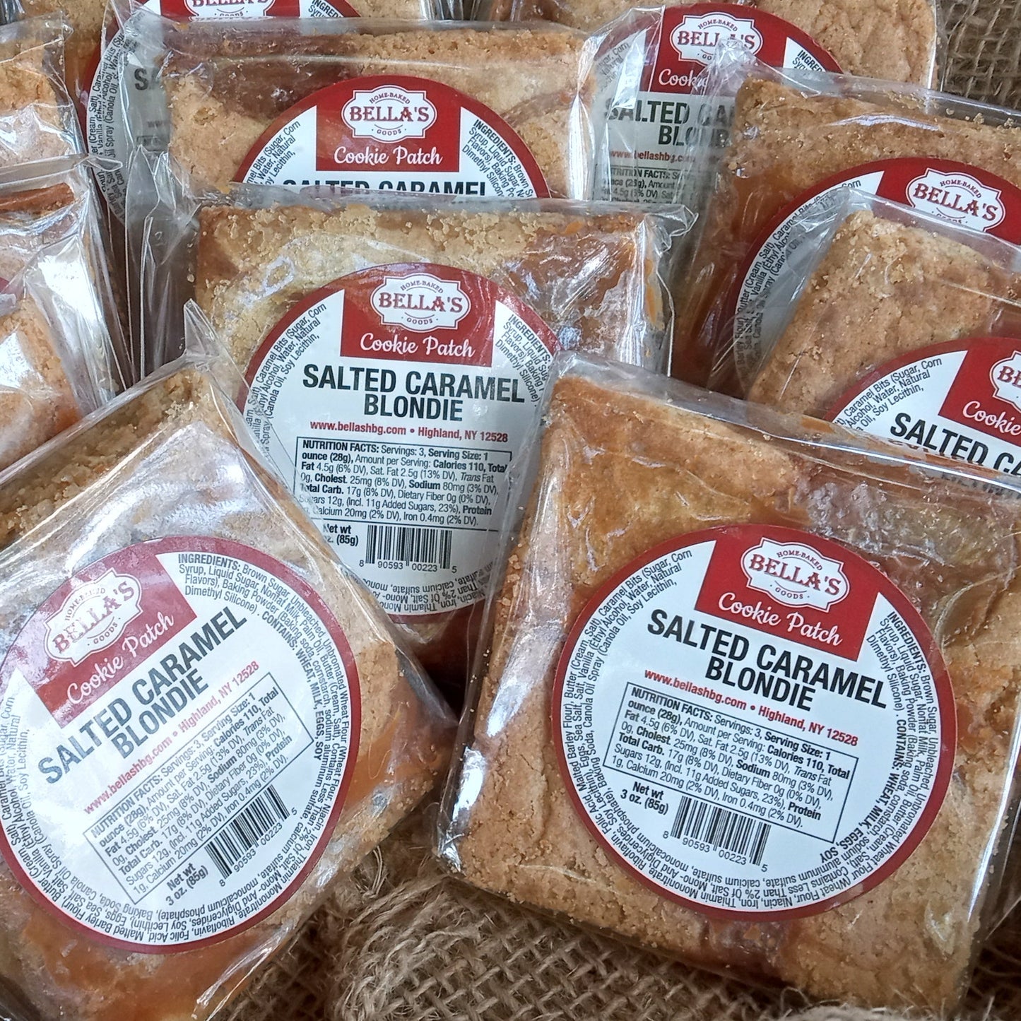 Packaged salted caramel blondies in a woven basket